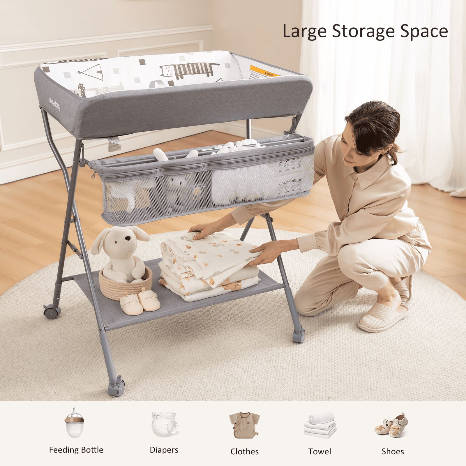 Large mesh organizer and lower storage shelf on the Maydolly 208 changing table