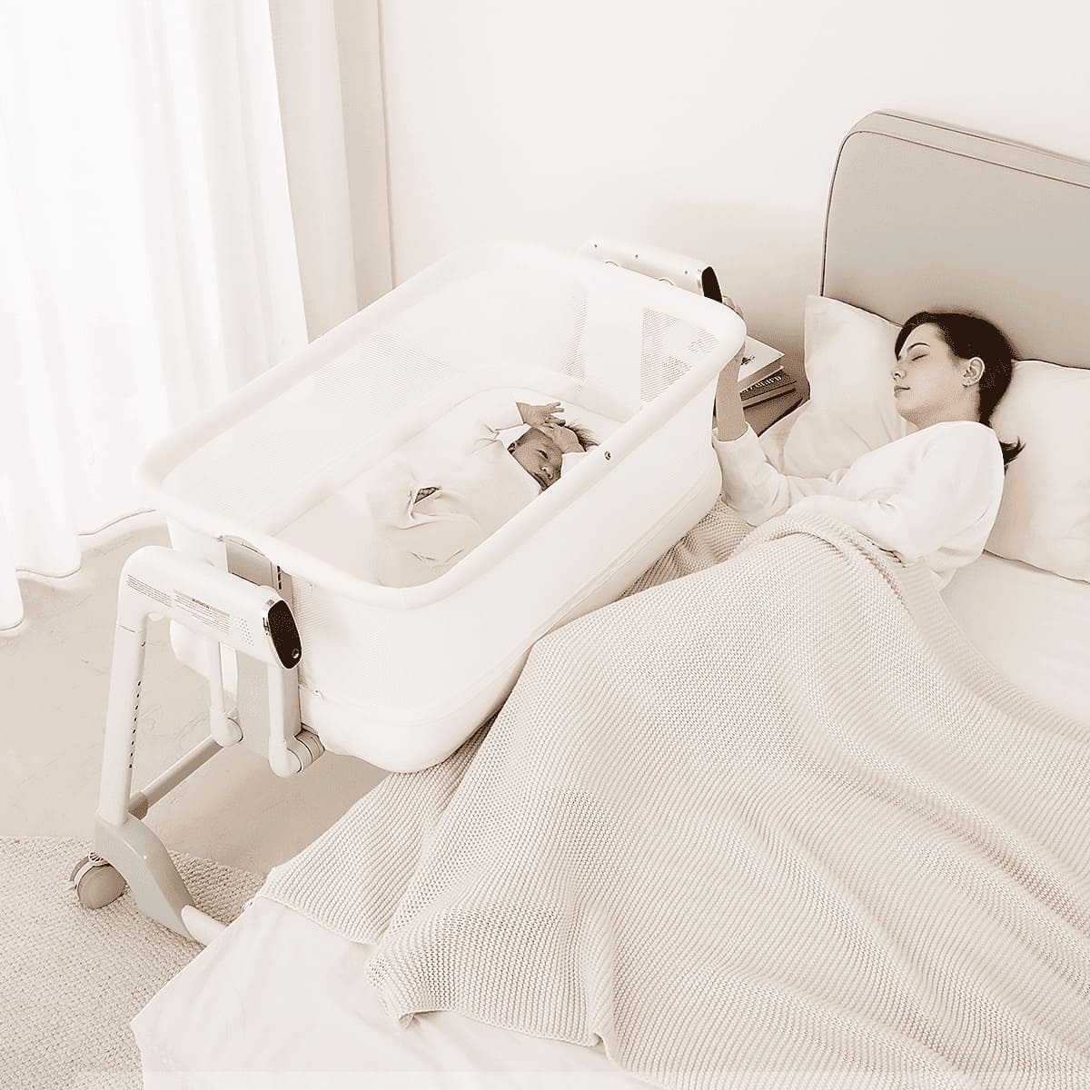 Maydolly 506 bedside bassinet with baby sleeping next to a parent